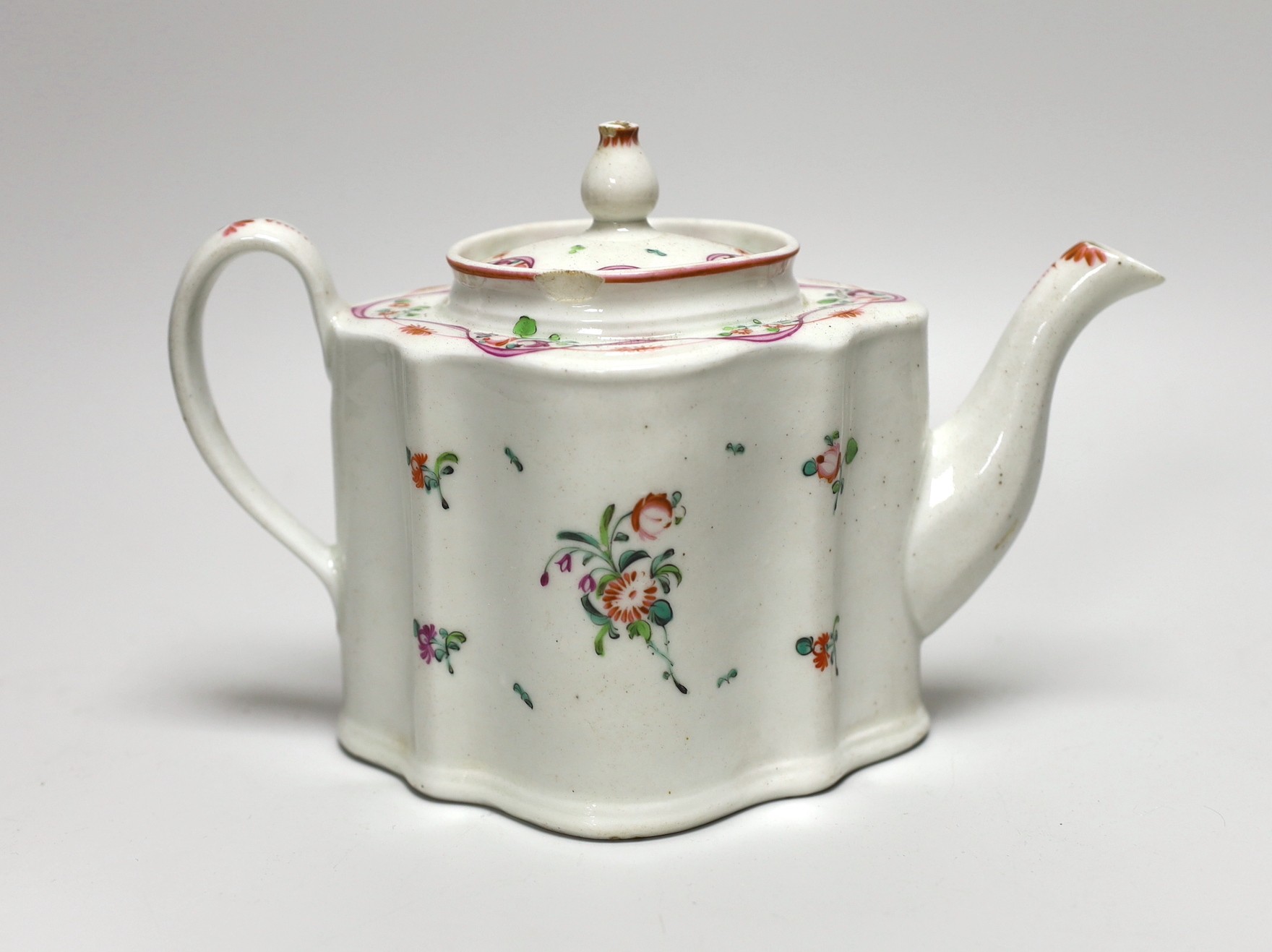 A late 18th century painted Newhall teapot and cover. 14.5cm high